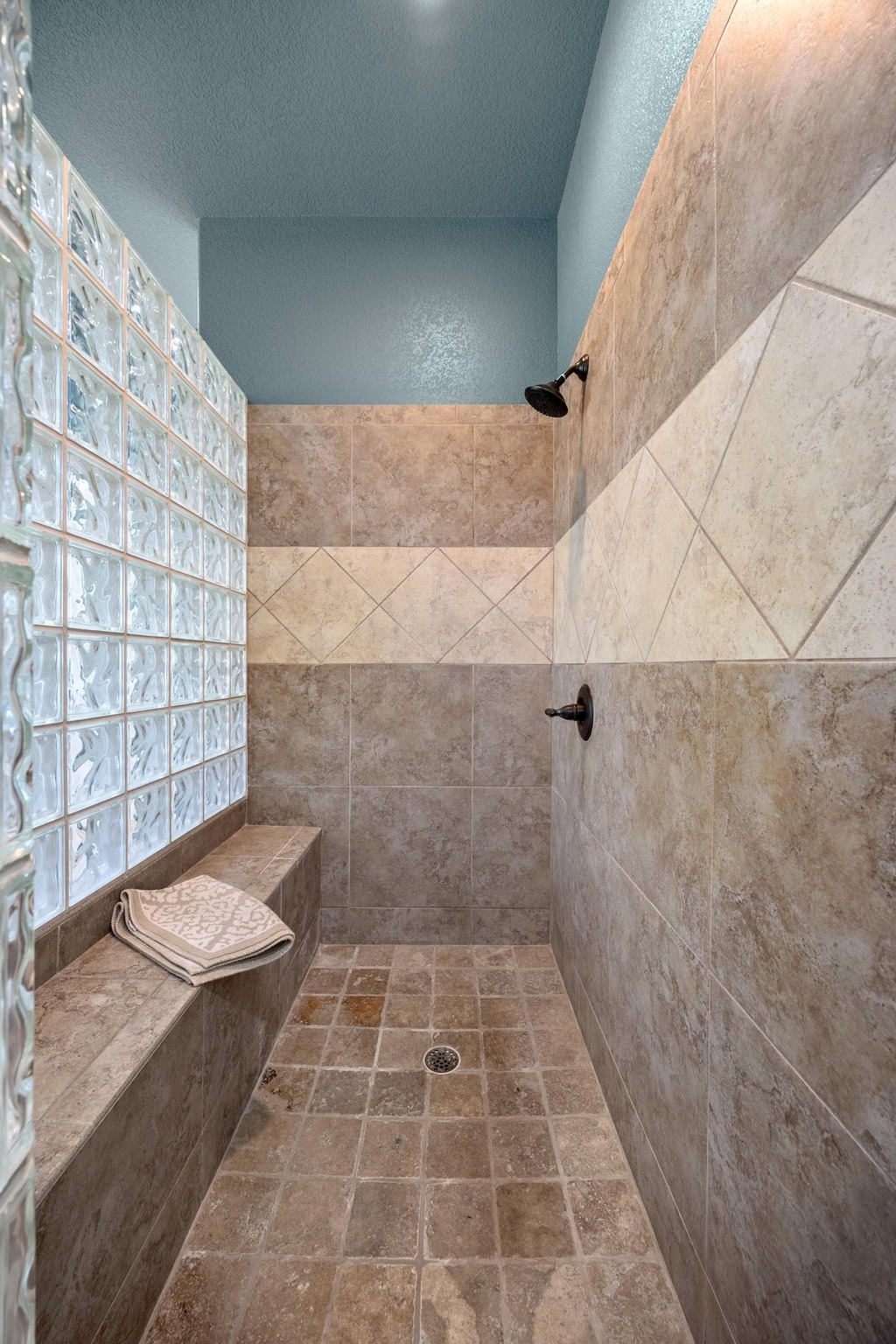 112 Shady Elm Georgetown, TX 78633 - Photo 17 of 31 a bathroom with a shower