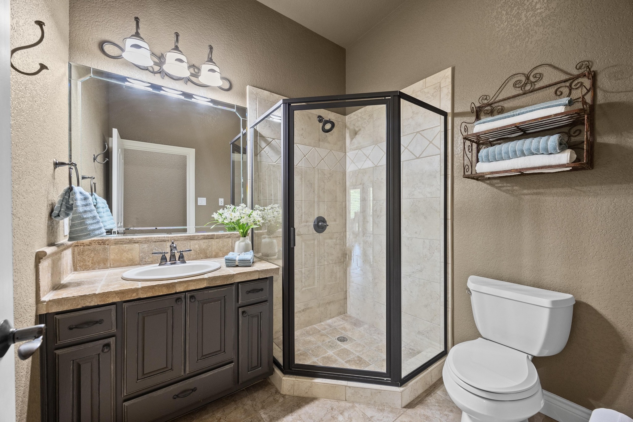 112 Shady Elm Georgetown, TX 78633 - Photo 20 of 31 a bathroom with a double vanity sink mirror and toilet