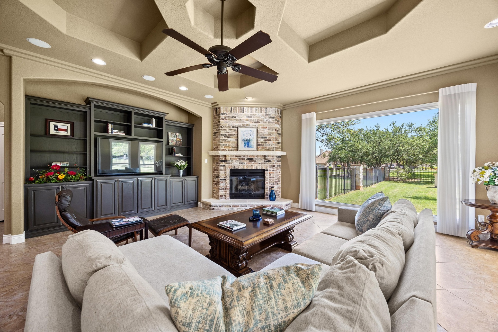 112 Shady Elm Georgetown, TX 78633 - Photo 5 of 31 a living room with furniture fireplace and flat screen tv