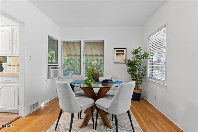 a kitchen with a sink and a stove top oven