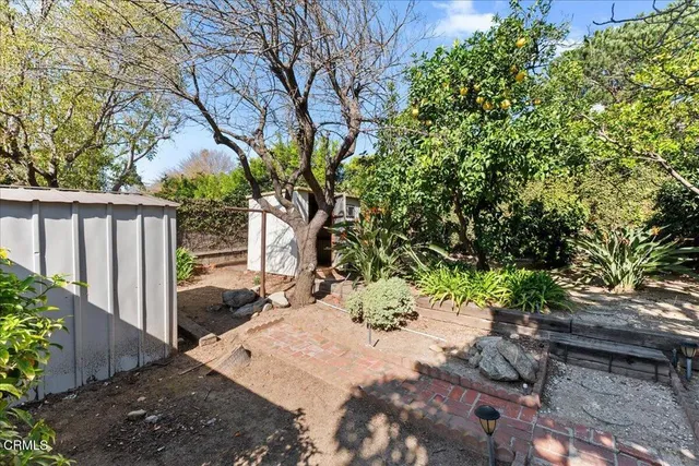 a view of a back yard of the house