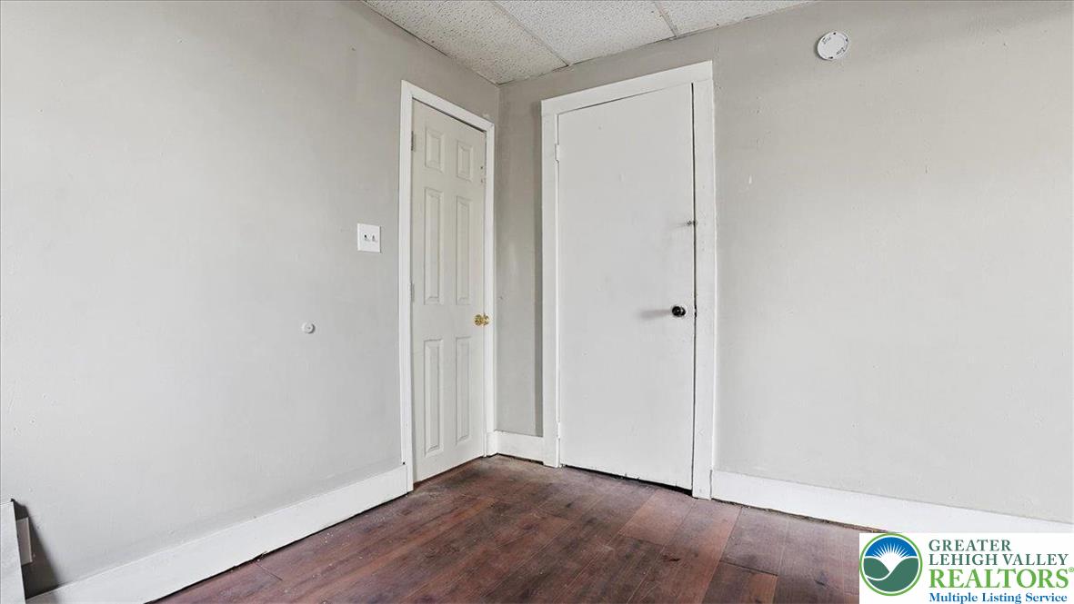 202 North Courtland Street, Unit 1 & 2 East Stroudsburg, PA 18301 - Photo 33 of 49 an empty room with wooden floor