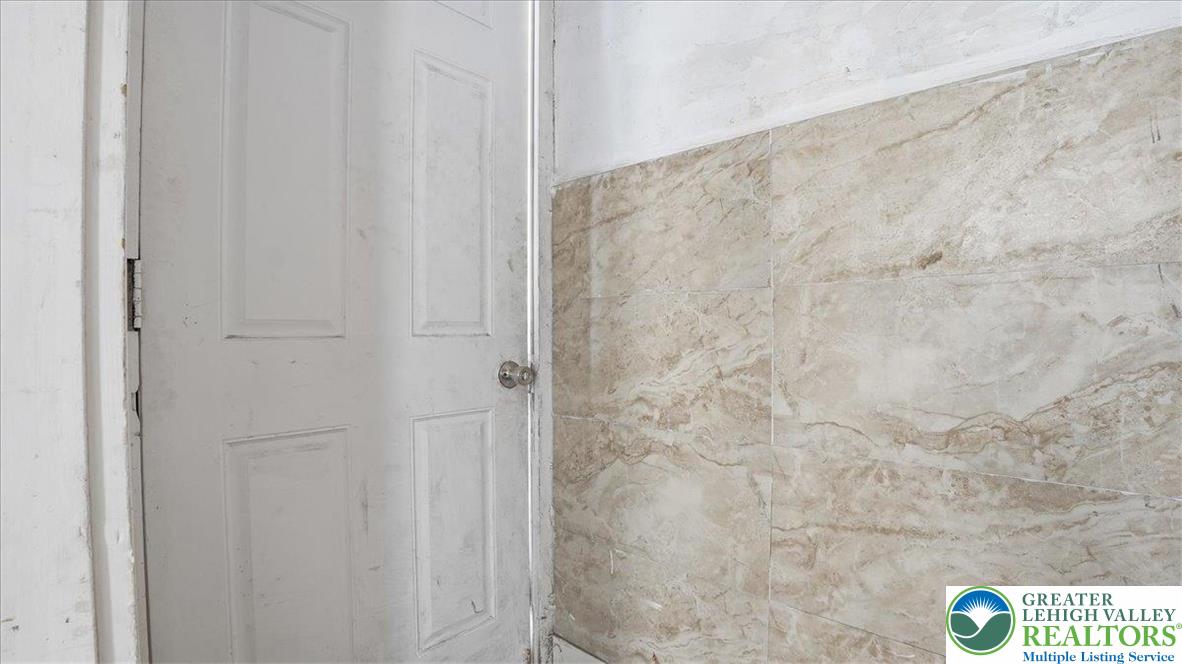 202 North Courtland Street, Unit 1 & 2 East Stroudsburg, PA 18301 - Photo 36 of 49 a bathroom with a shower