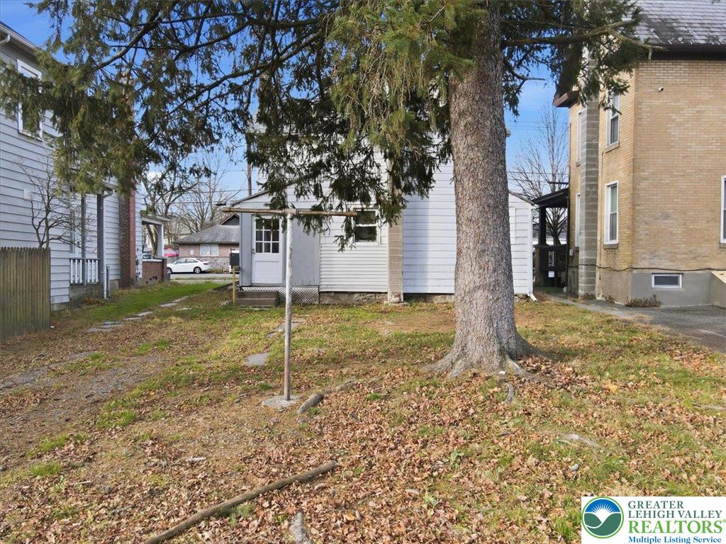 202 North Courtland Street, Unit 1 & 2 East Stroudsburg, PA 18301 - Photo 42 of 49 a view of a house with a yard