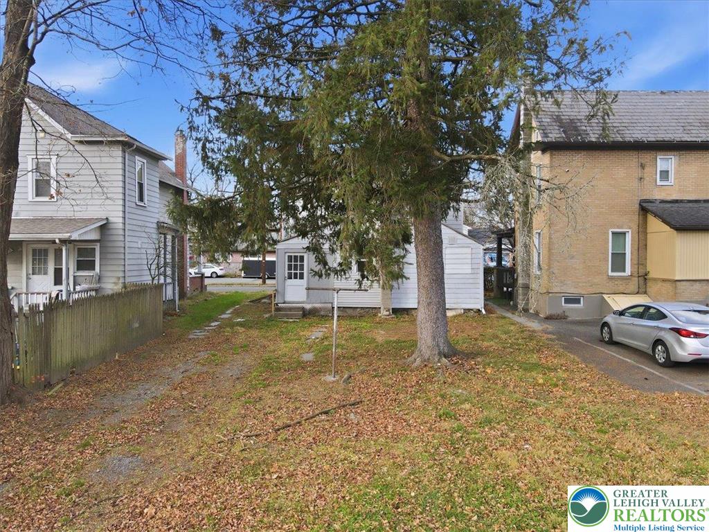 202 North Courtland Street, Unit 1 & 2 East Stroudsburg, PA 18301 - Photo 43 of 49 a view of a house with a yard