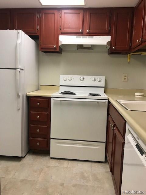 1225 South Oneida Street, Unit 226 Denver, CO 80224 - Photo 4 of 11 a utility room with dryer and washer