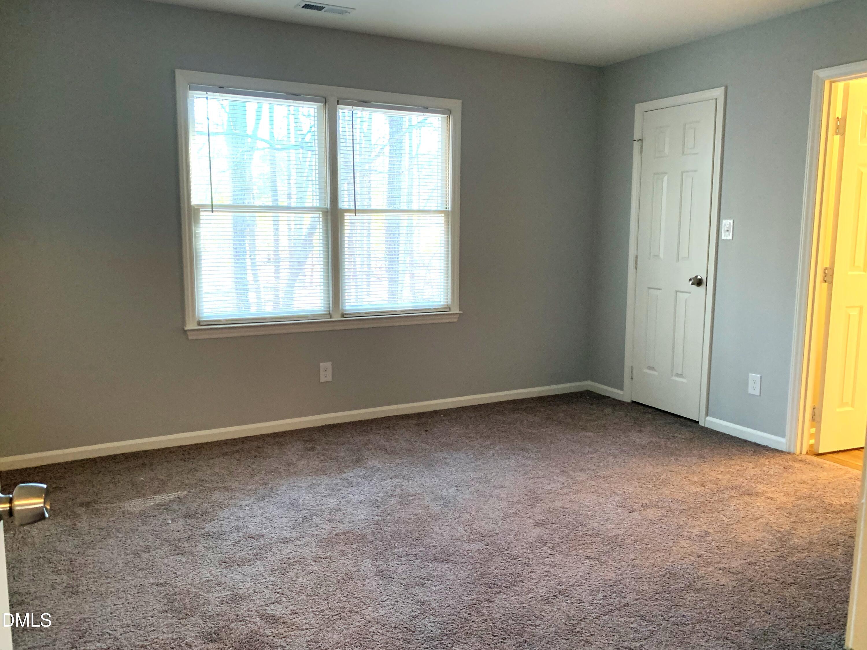 5533 Kaplan Drive, Unit A Raleigh, NC 27606 - Photo 10 of 12 5533 Kaplan Master Bedroom