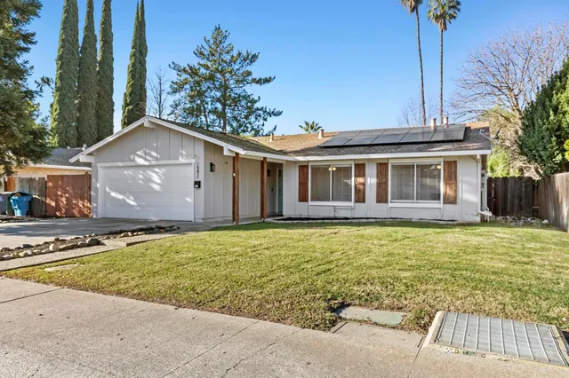 a house view with a garden space