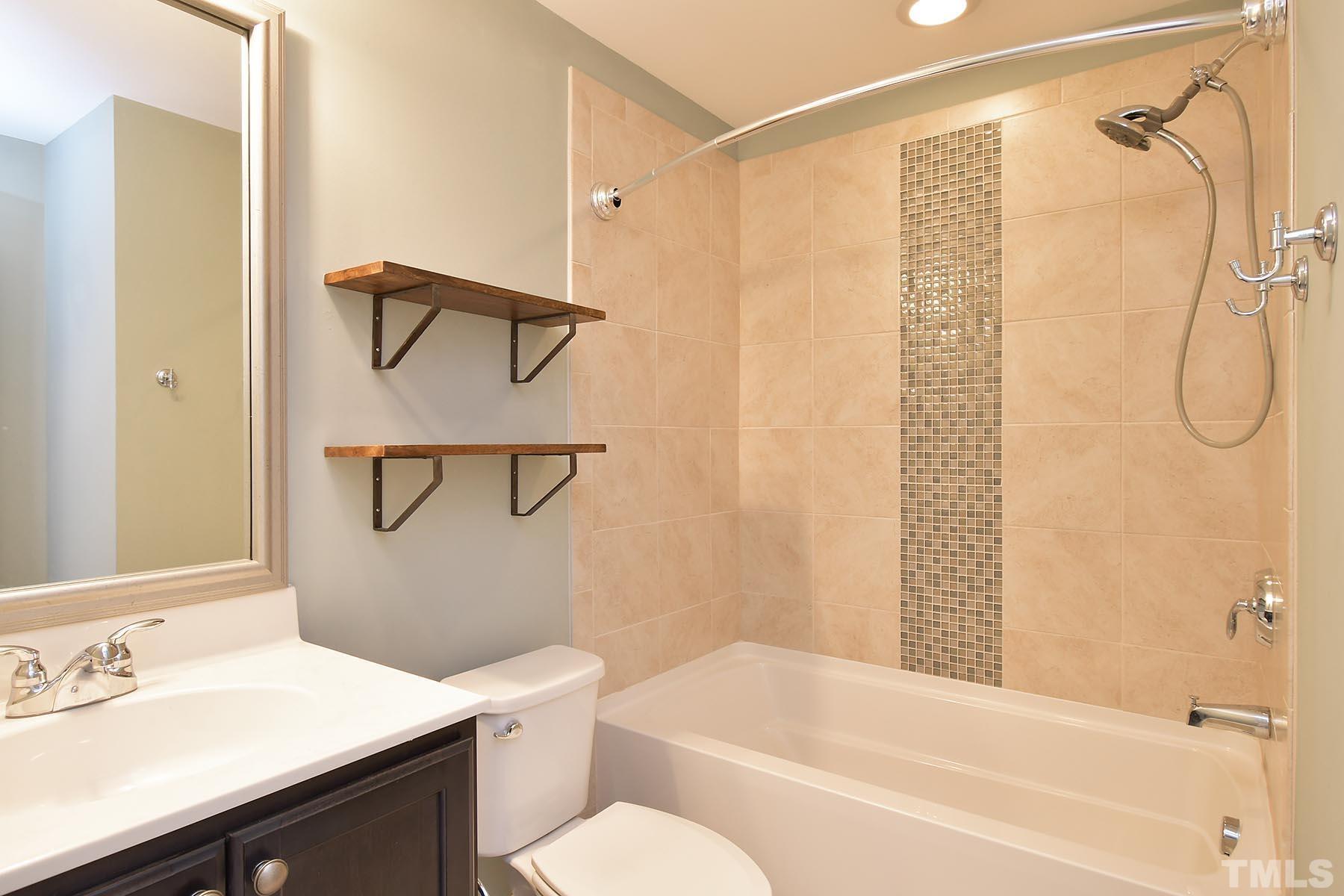 511 North Person Street, Unit 107 Raleigh, NC 27604 - Photo 17 of 36 Hall bath upstairs