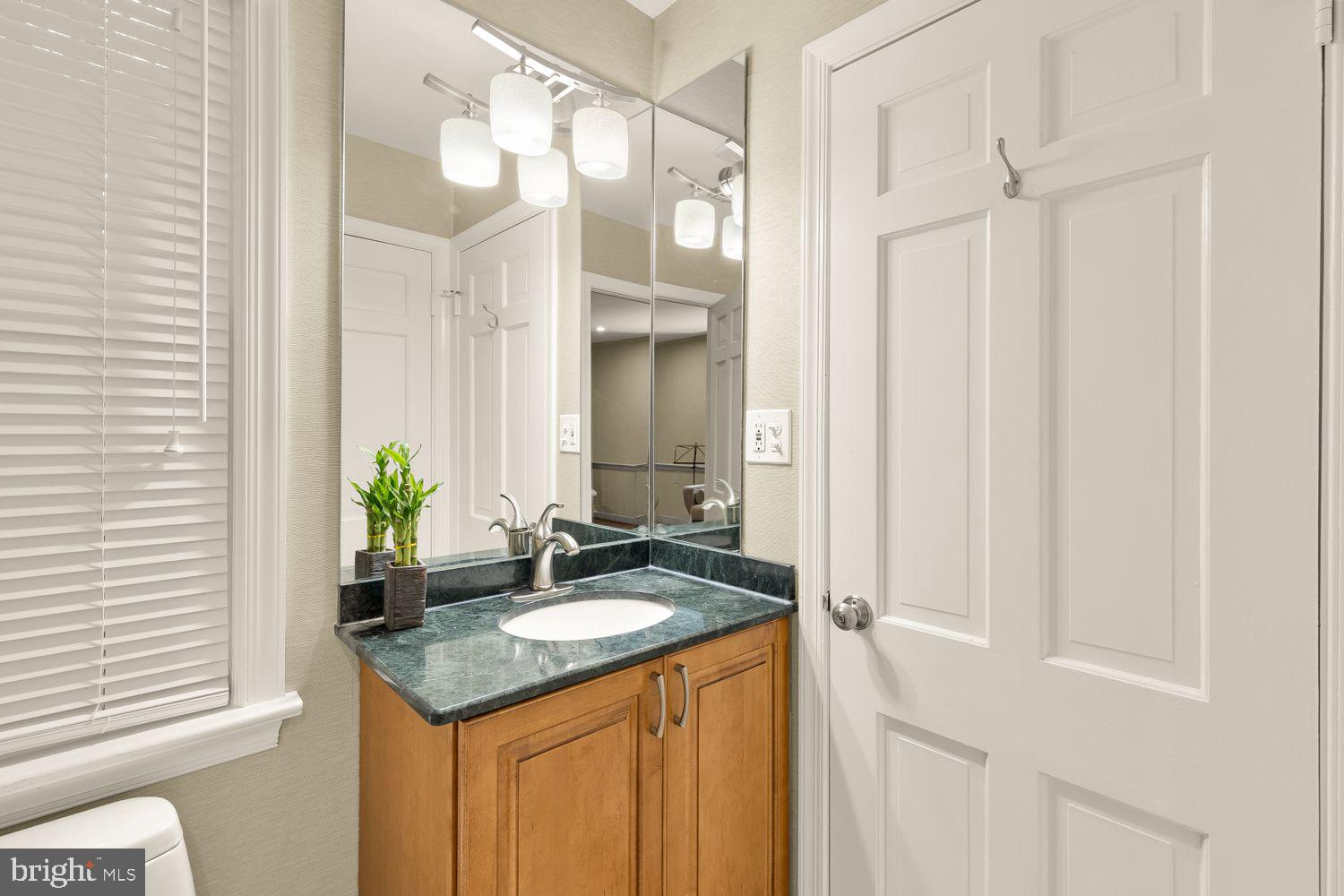 5810 Overlea Road Bethesda, MD 20816 - Photo 21 of 52 Half-bath on the first floor