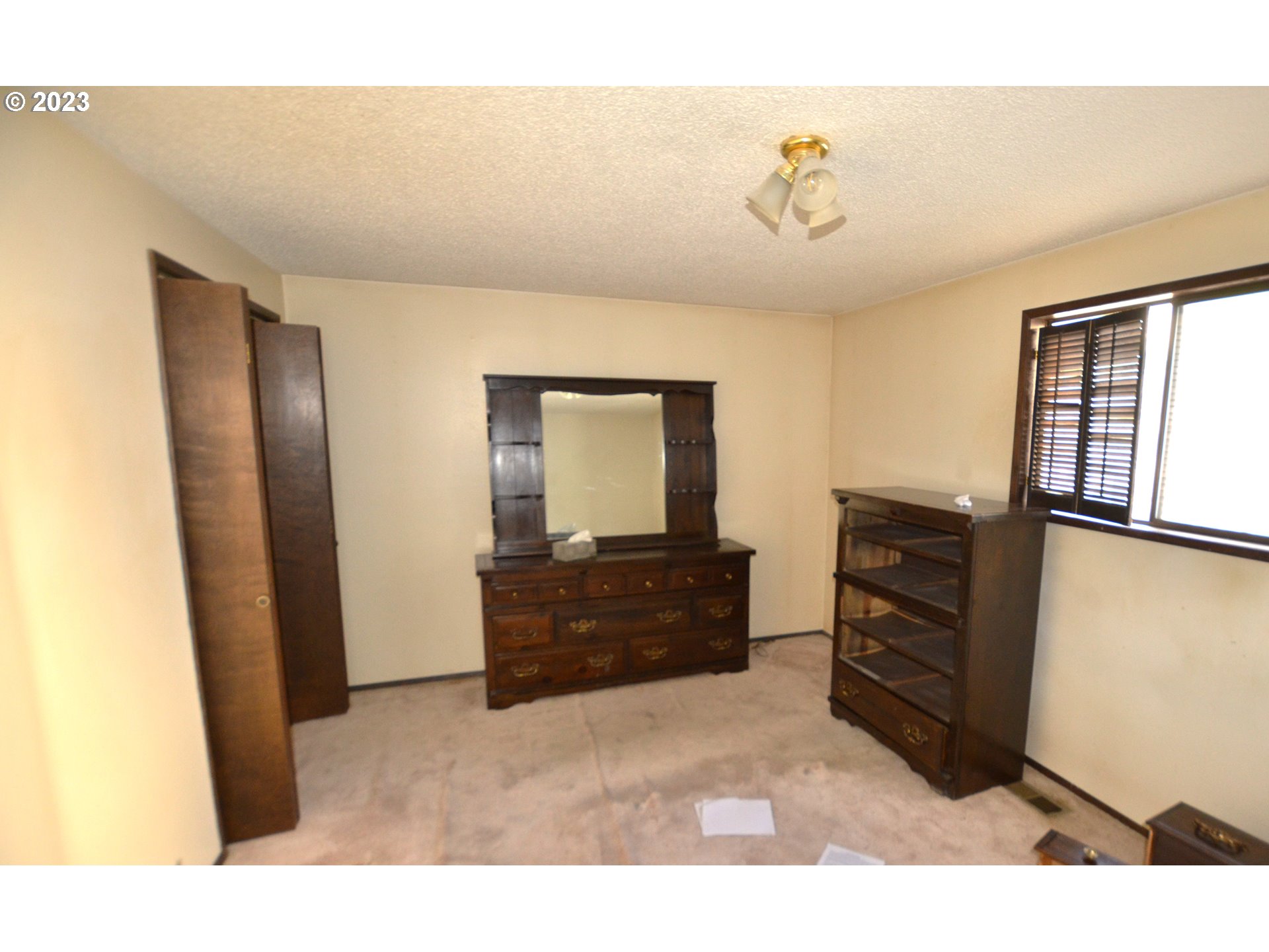 1604 Southwest 22nd Street Pendleton, OR 97801 - Photo 12 of 23 a living room with furniture and a window