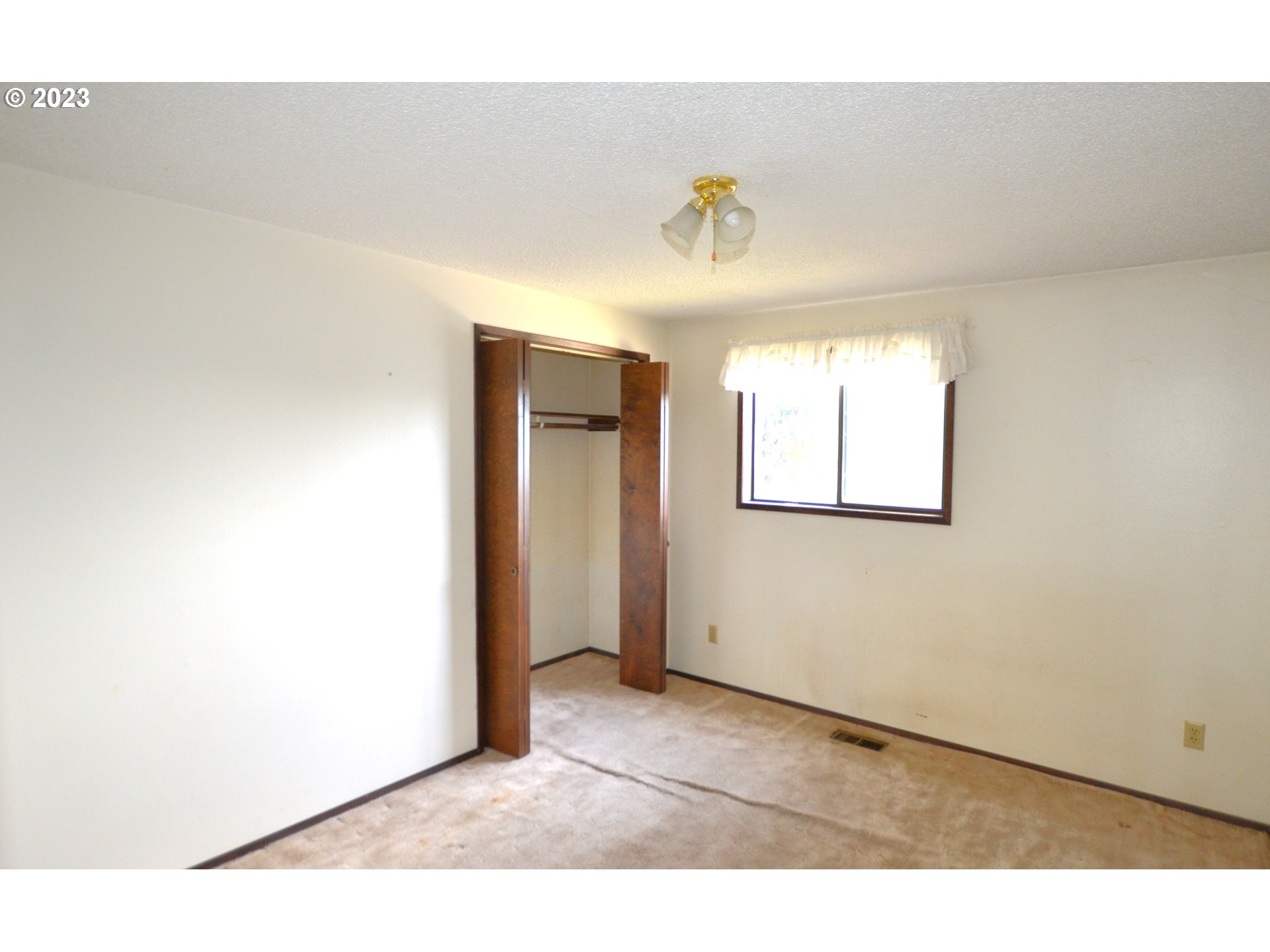 1604 Southwest 22nd Street Pendleton, OR 97801 - Photo 16 of 23 a view of an empty room and window