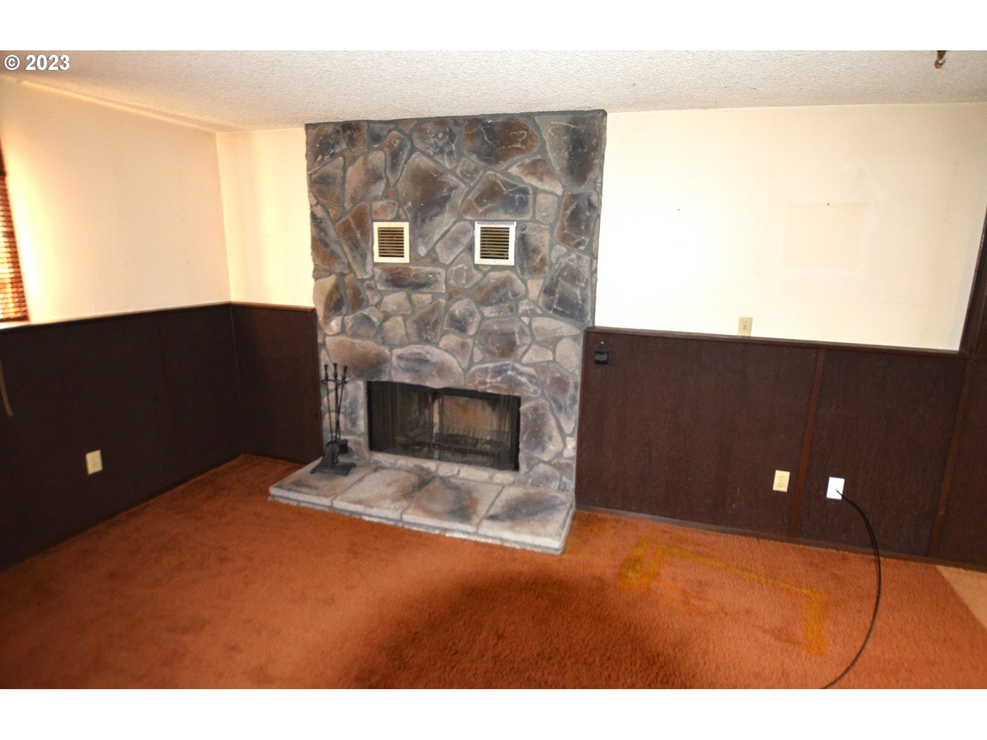 1604 Southwest 22nd Street Pendleton, OR 97801 - Photo 18 of 23 a view of empty room with a fireplace