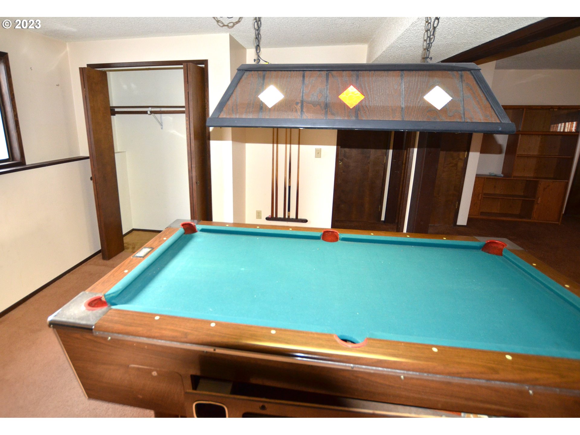 1604 Southwest 22nd Street Pendleton, OR 97801 - Photo 19 of 23 a room with pool table and windows
