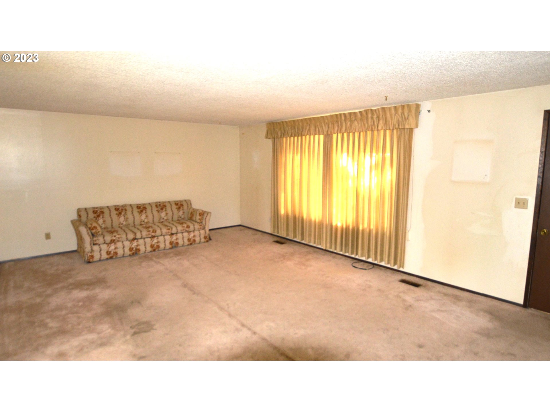 1604 Southwest 22nd Street Pendleton, OR 97801 - Photo 7 of 23 a black and white photo of a room