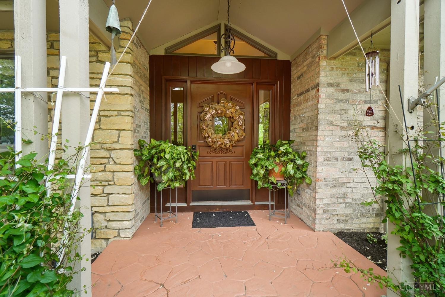 10907 Sand Run Road Harrison, OH 45030 - Photo 7 of 88 Covered front porch and oversized Rosewood entry door.