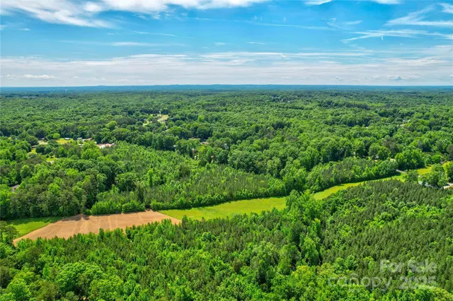 a view of a yard with an outdoor space