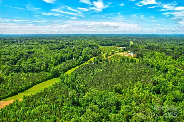 a view of a yard with an outdoor space