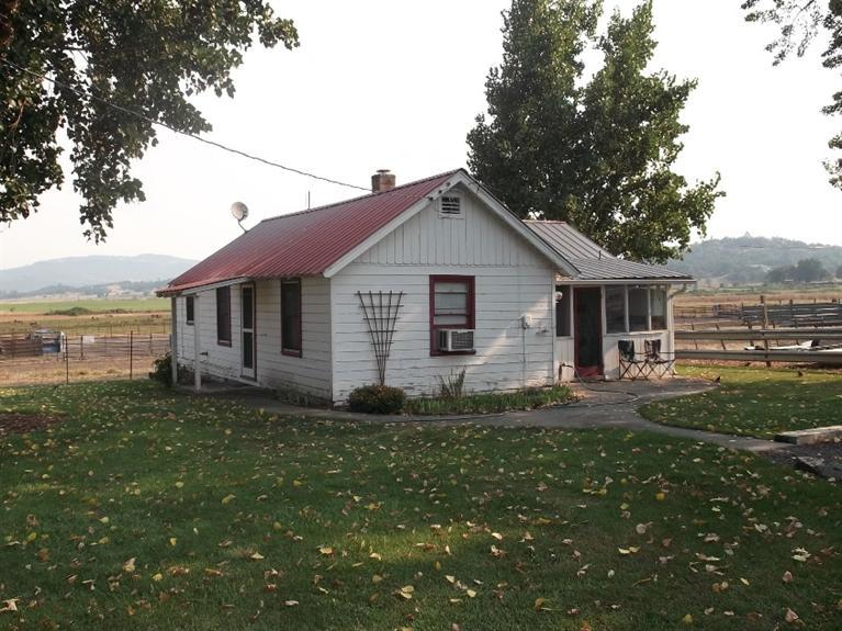 1604 Meridian Road Eagle Point, OR 97524 - Photo 15 of 26 a front view of house with yard and green space