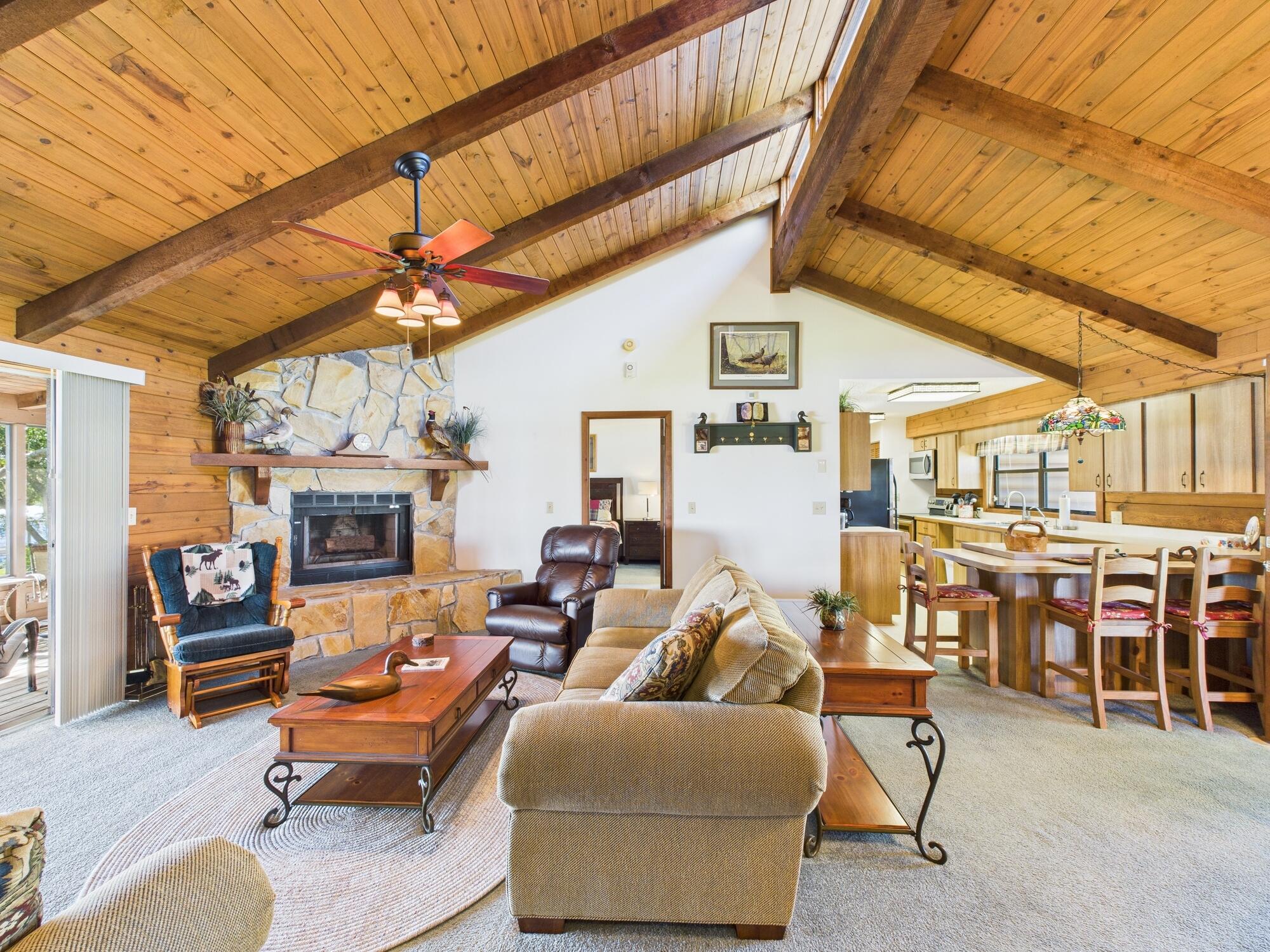 14266 Southwest 144th Parkway Okeechobee, FL 34974 - Photo 15 of 63 a living room with furniture a fireplace and potted plants