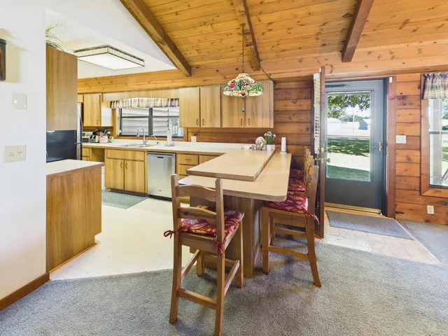 a kitchen with a stove and a microwave