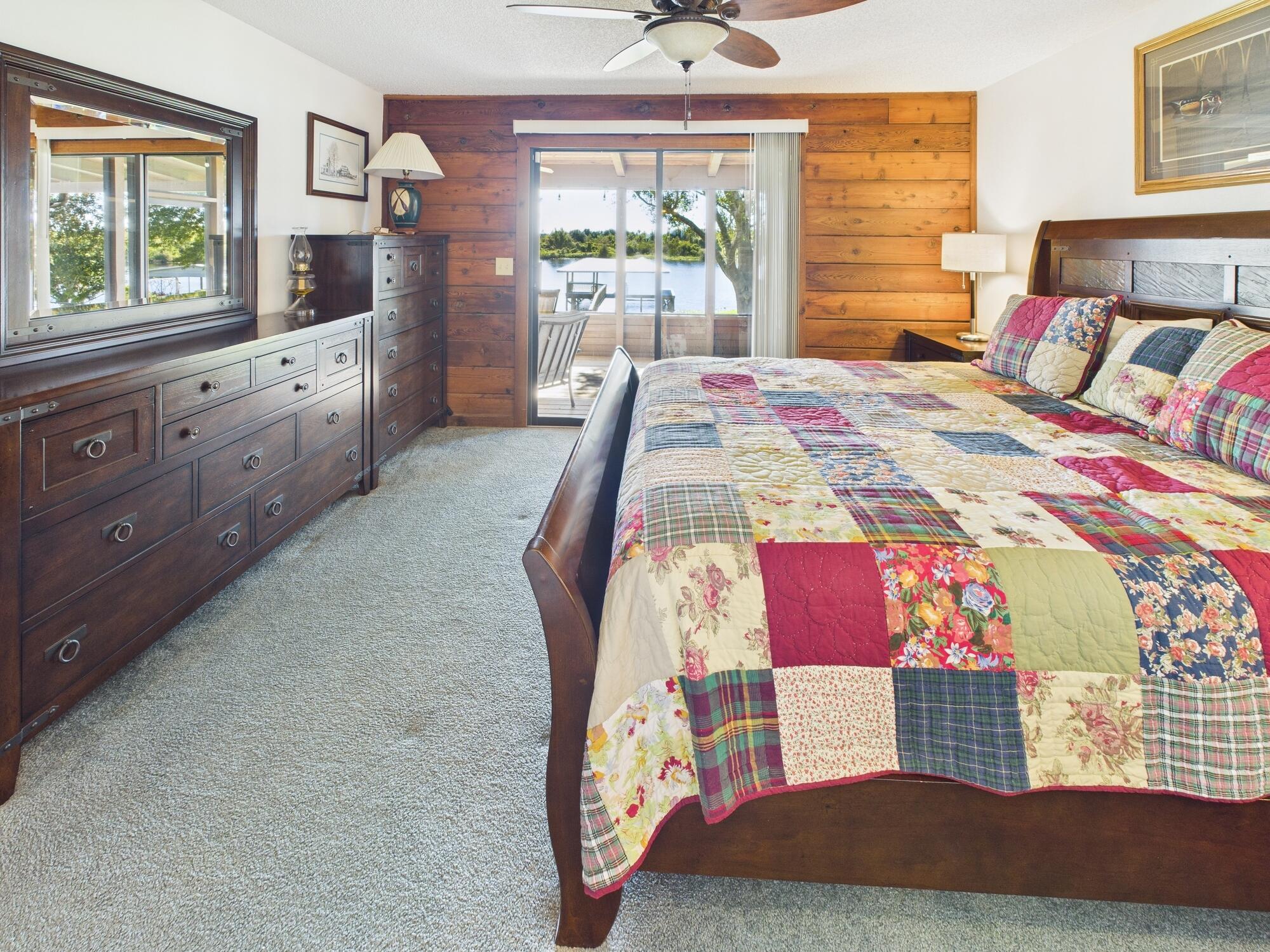 14266 Southwest 144th Parkway Okeechobee, FL 34974 - Photo 25 of 63 a bedroom with a bed and a window