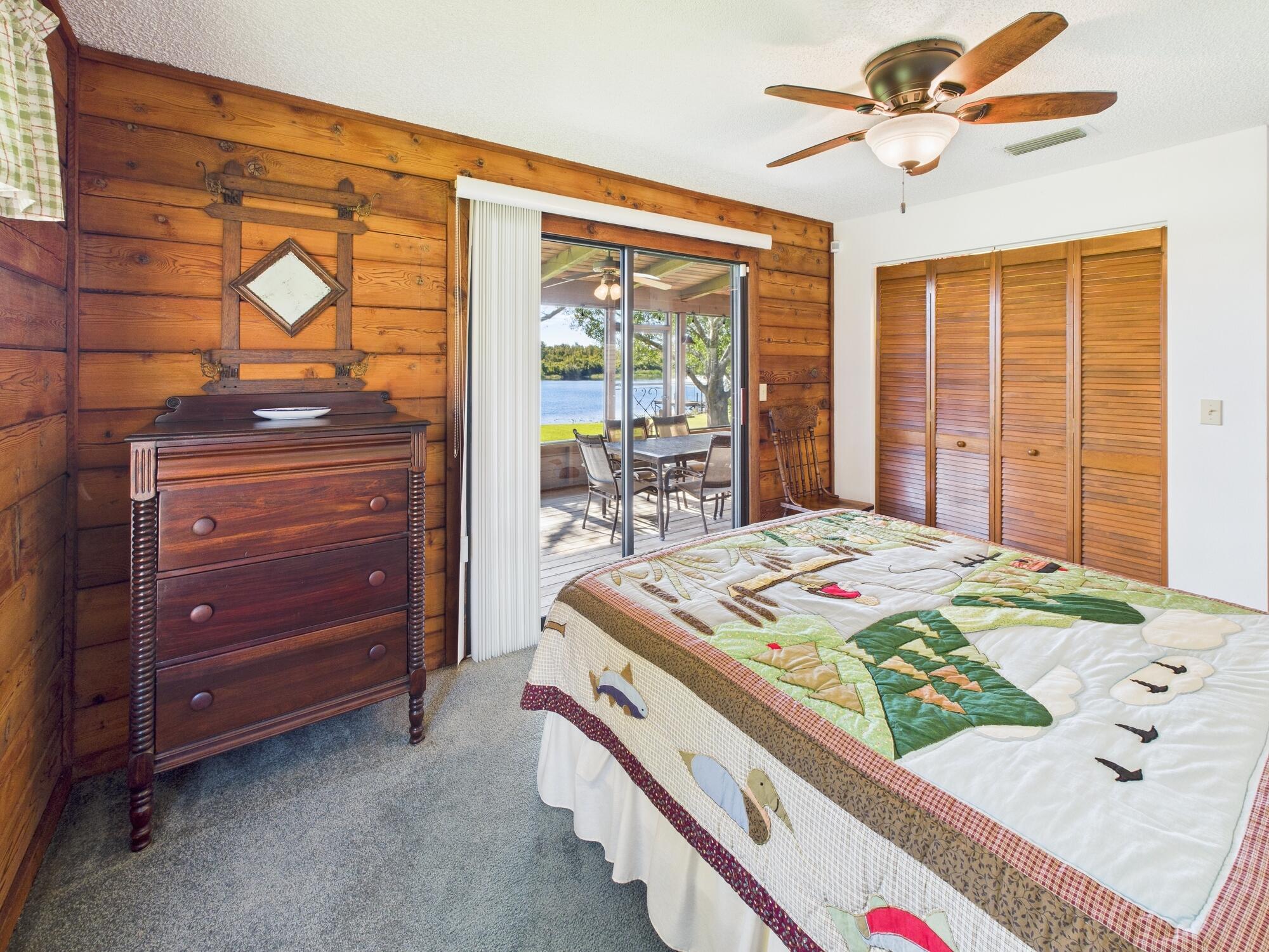 14266 Southwest 144th Parkway Okeechobee, FL 34974 - Photo 32 of 63 a bed sitting in a room next to a window