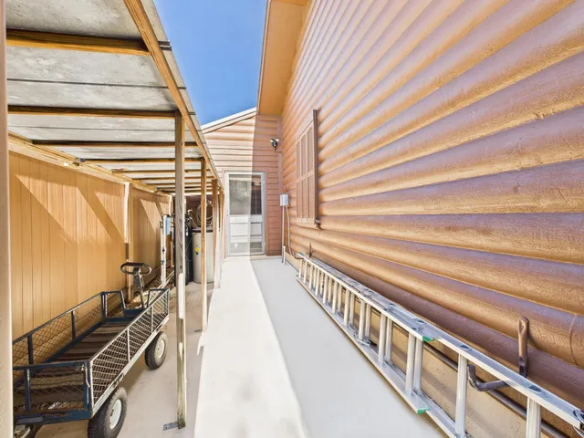 a kitchen with stainless steel appliances a refrigerator and a stove
