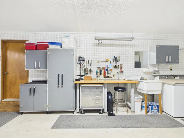 a view of backyard with swimming pool