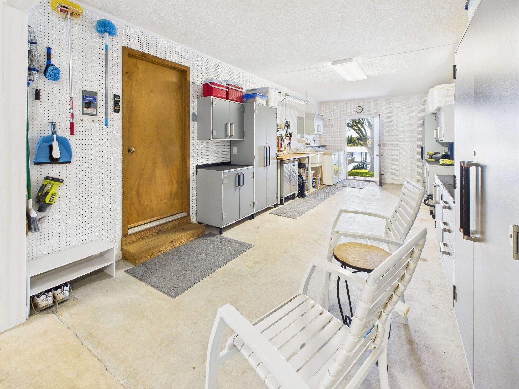 14266 Southwest 144th Parkway Okeechobee, FL 34974 - Photo 47 of 63 a kitchen with stainless steel appliances a refrigerator and a stove