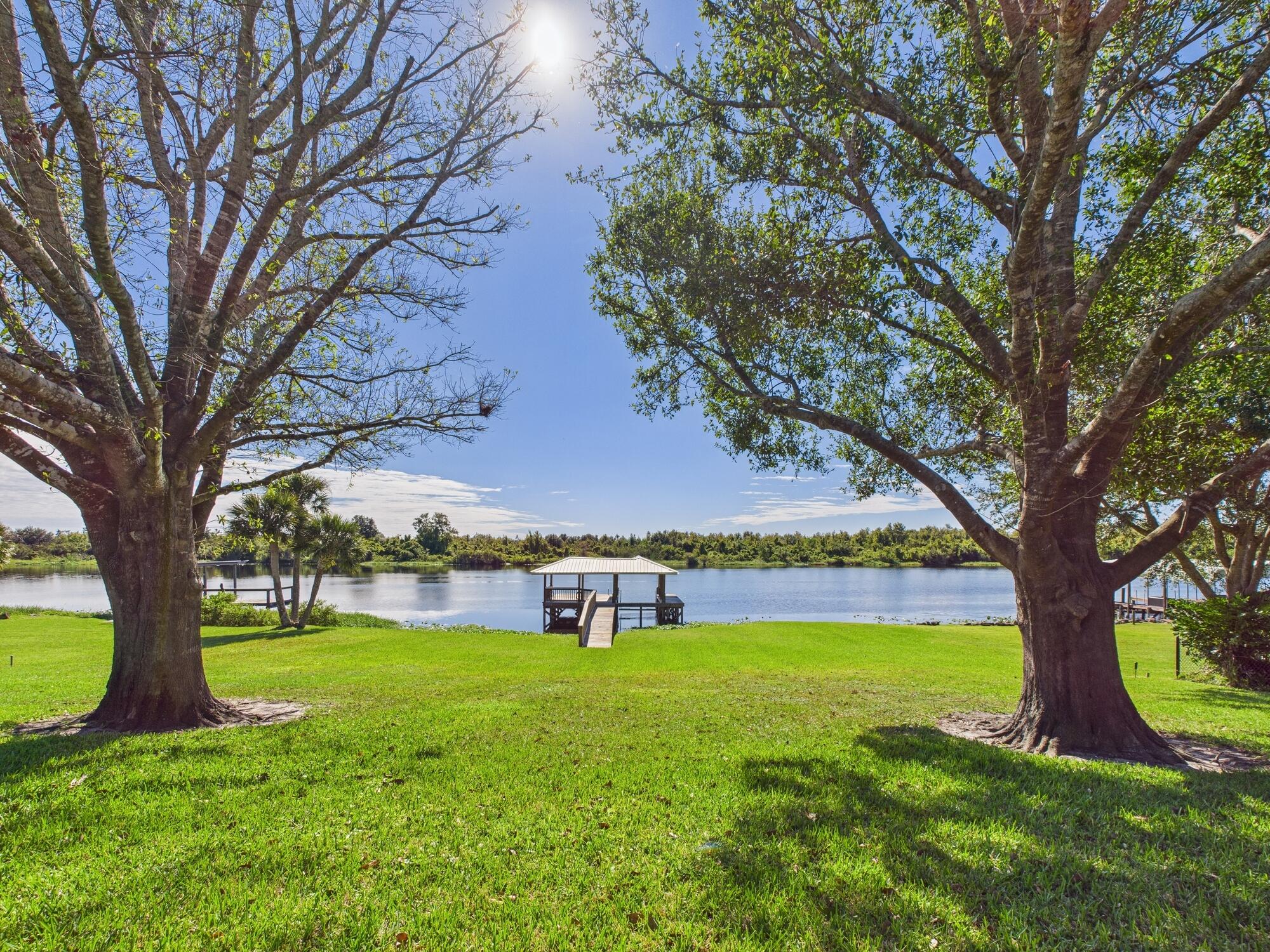 14266 Southwest 144th Parkway Okeechobee, FL 34974 - Photo 50 of 63 a view of backyard with swimming pool