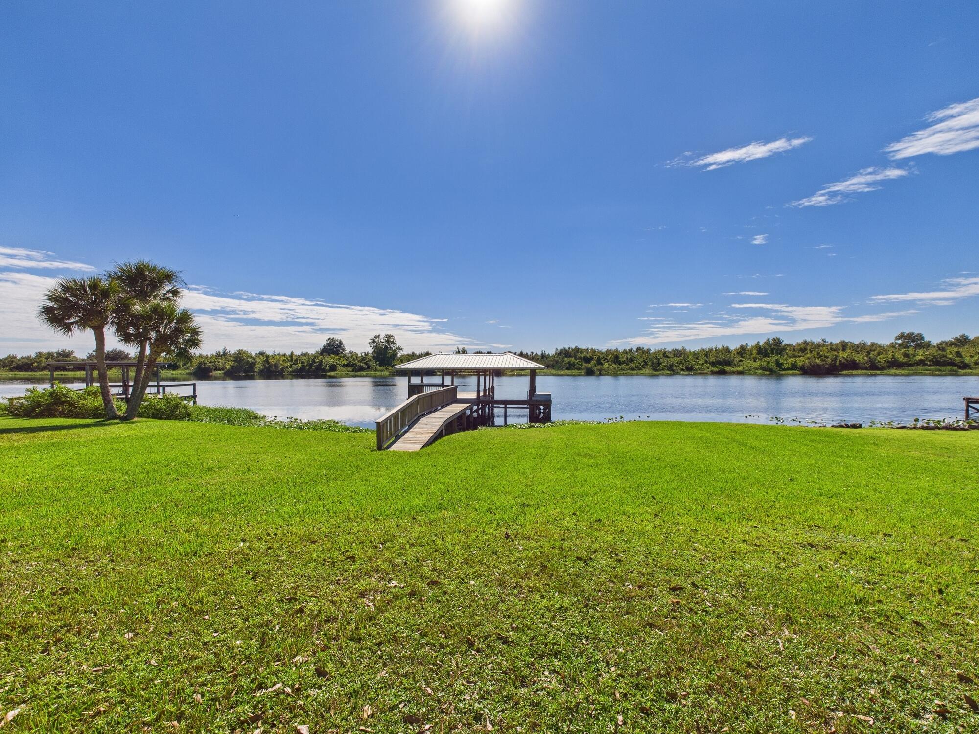 14266 Southwest 144th Parkway Okeechobee, FL 34974 - Photo 51 of 63 a view of a field with sitting area