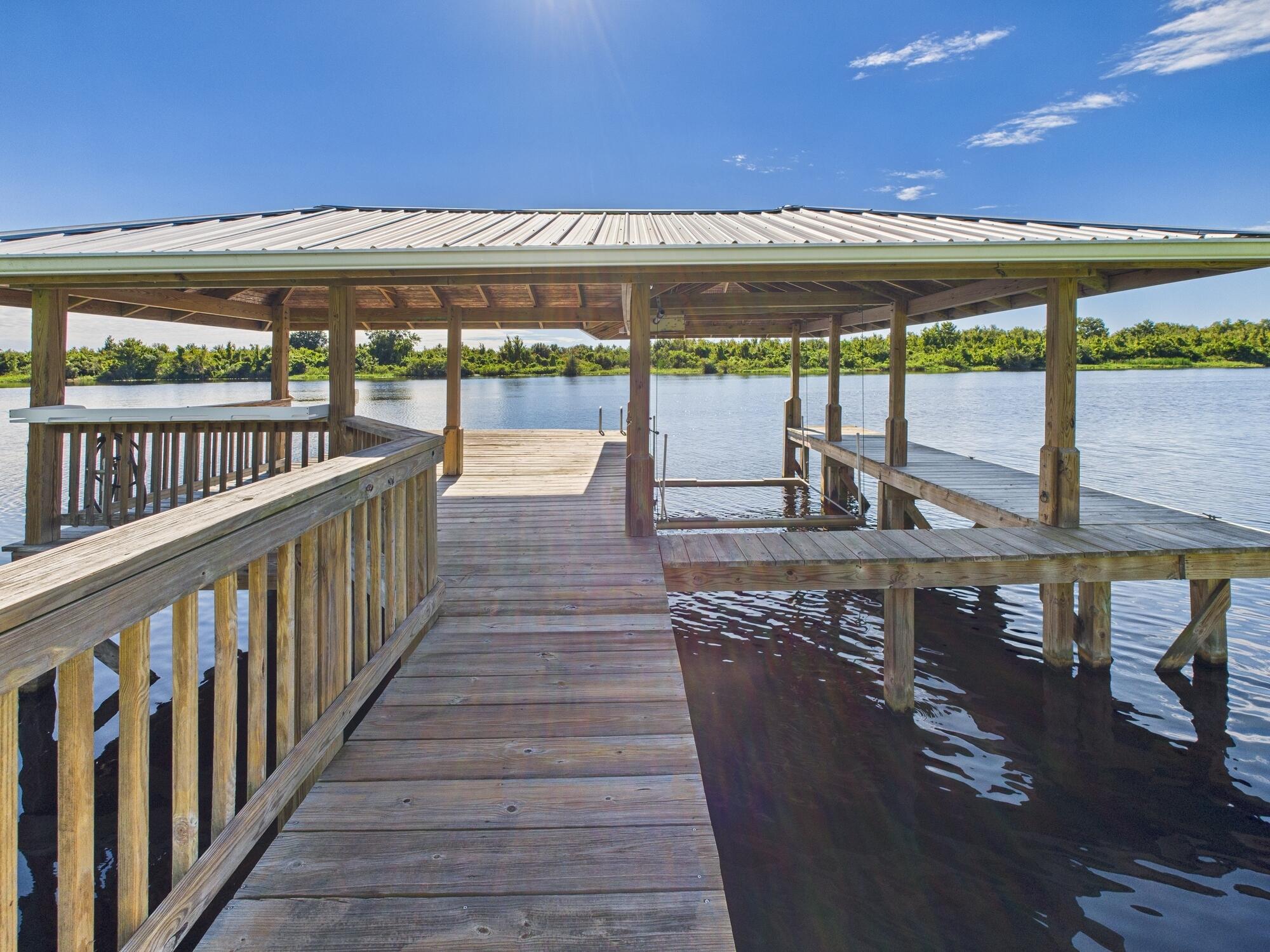 14266 Southwest 144th Parkway Okeechobee, FL 34974 - Photo 53 of 63 a view of a swimming pool with a balcony