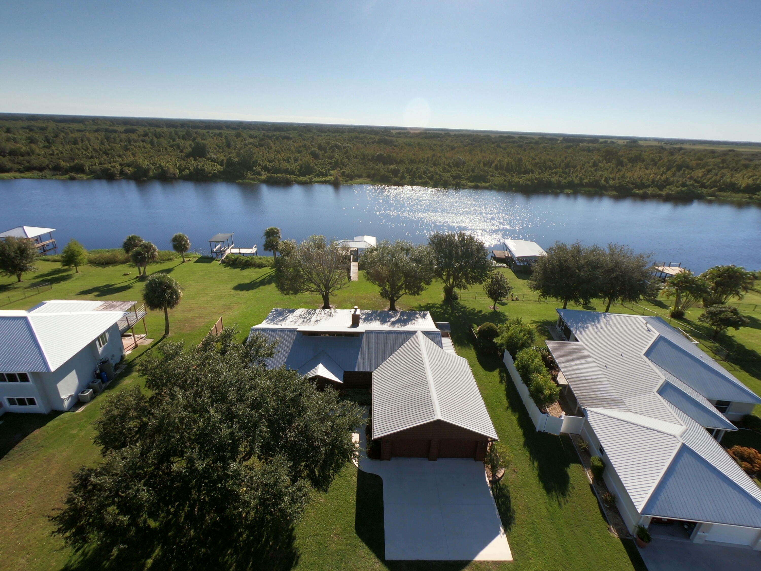 14266 Southwest 144th Parkway Okeechobee, FL 34974 - Photo 62 of 63 an aerial view of a house with ocean view