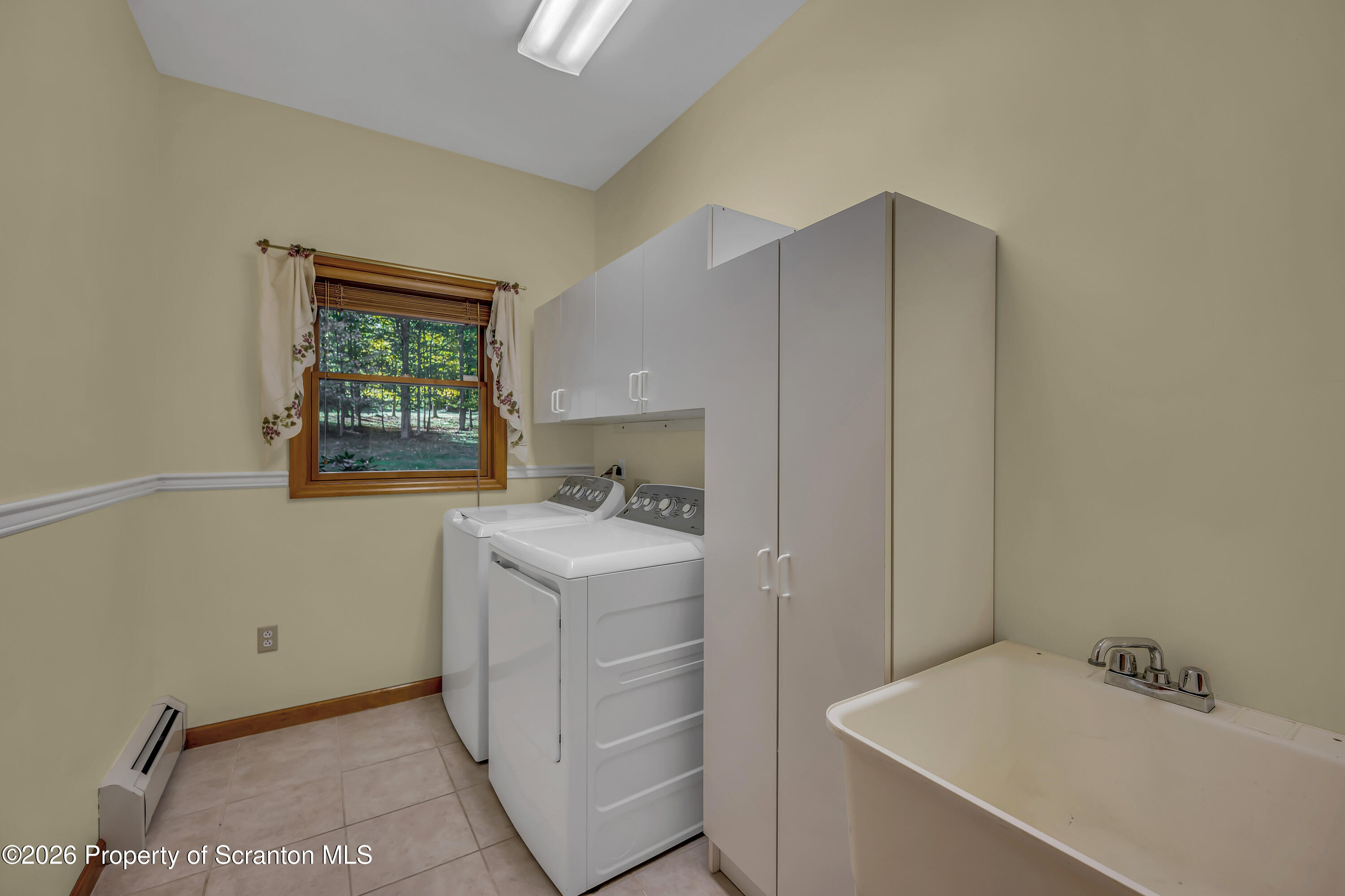 117 Hilltop Road Waverly, PA 18471 - Photo 27 of 57 1st floor laundry
