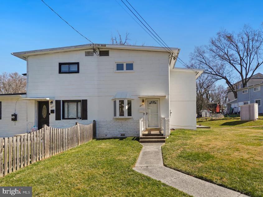a front view of house with yard
