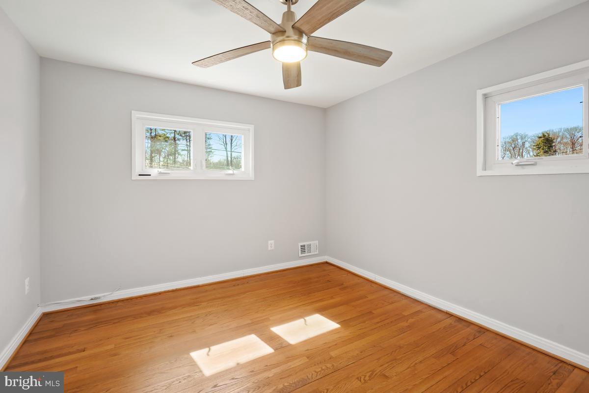 4213 Allison Circle Fairfax, VA 22030 - Photo 15 of 22 a view of empty room with wooden floor