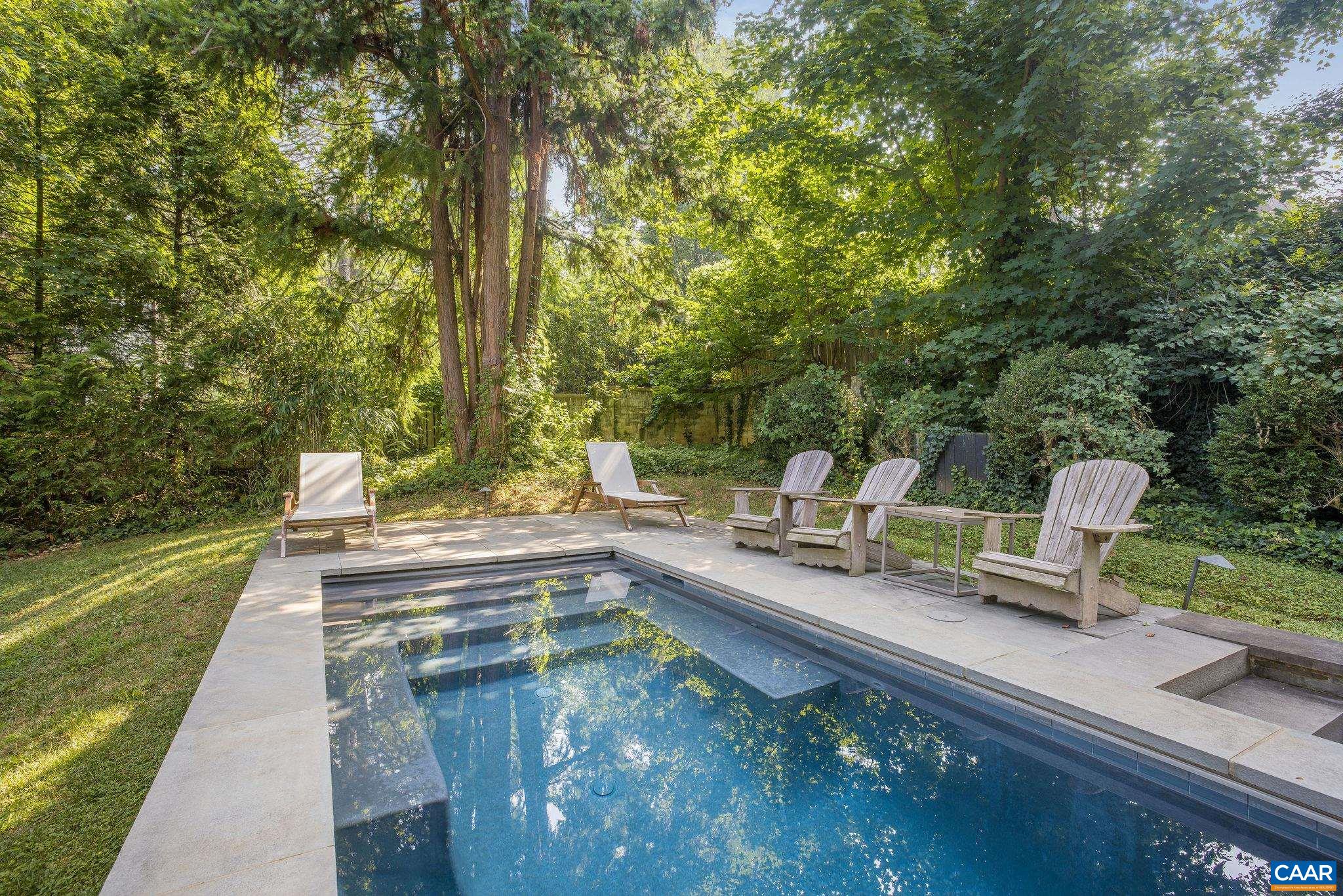 1204 Blue Ridge Road Charlottesville, VA 22903 - Photo 15 of 51 a view of swimming pool with chairs and garden