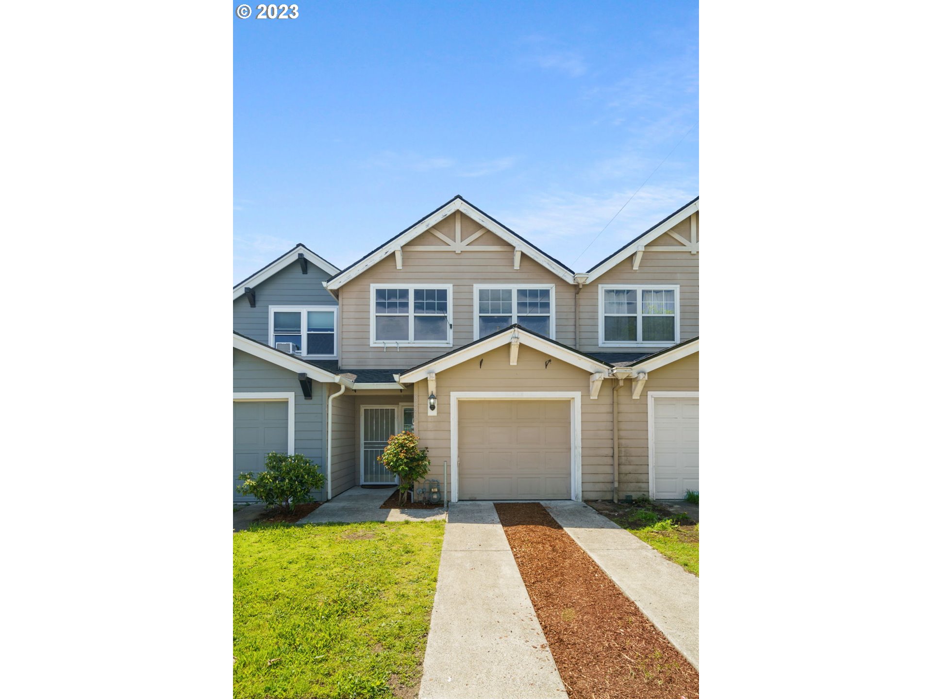 8342 Southeast Clinton Street Portland, OR 97266 - Photo 1 of 25 a front view of a house with a yard