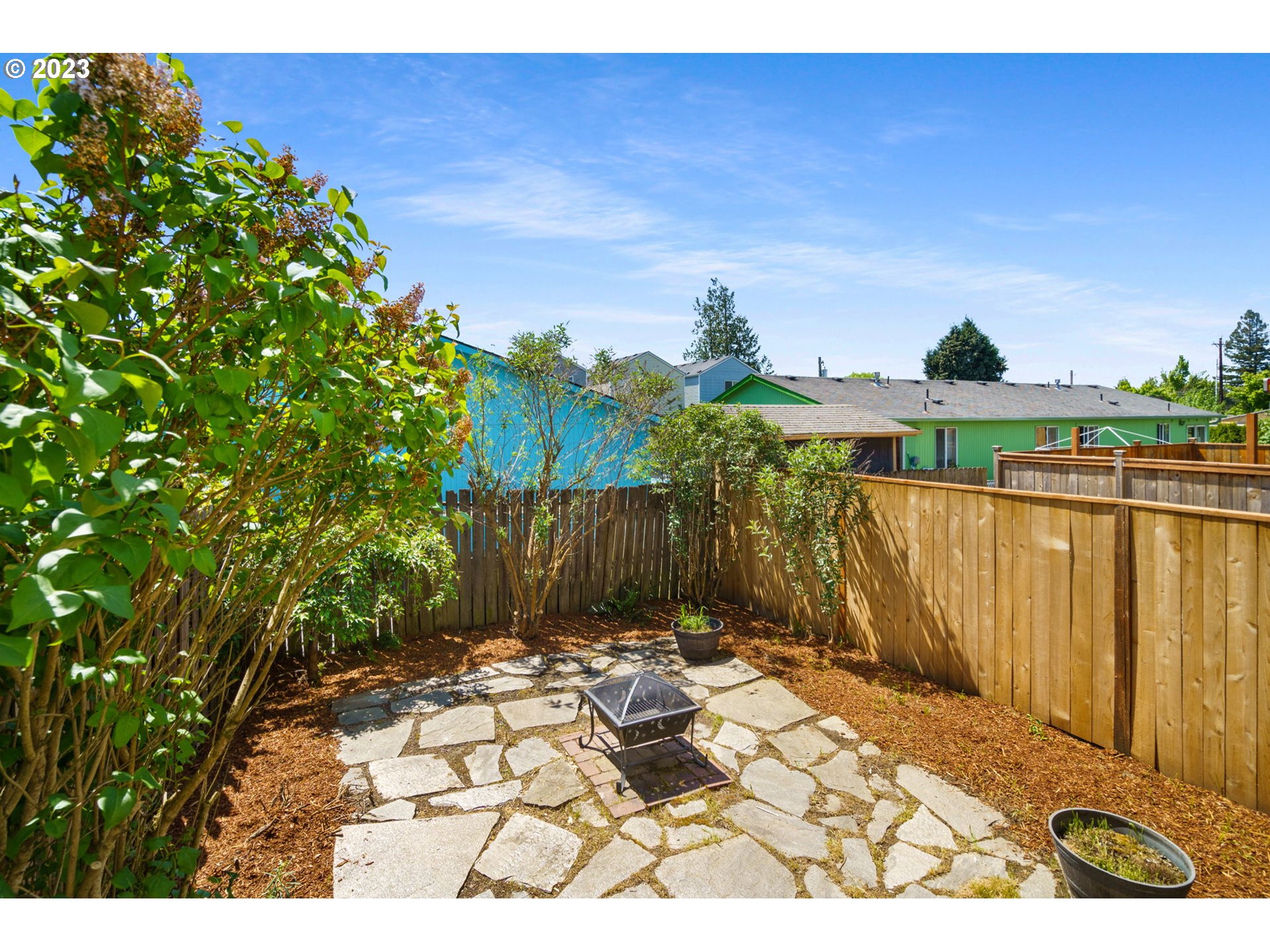 8342 Southeast Clinton Street Portland, OR 97266 - Photo 21 of 25 a view of balcony with wooden fence