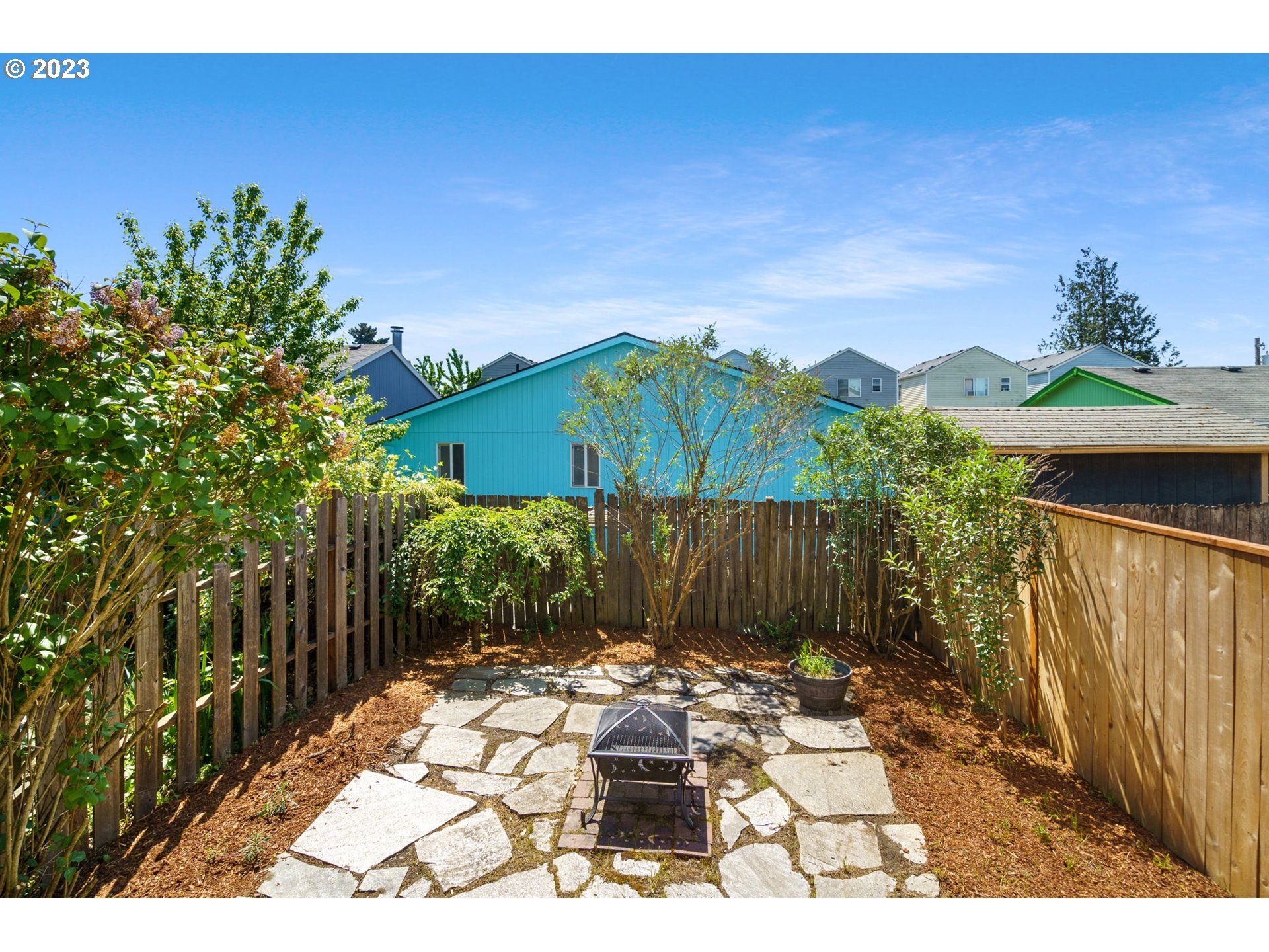 8342 Southeast Clinton Street Portland, OR 97266 - Photo 22 of 25 a view of a backyard