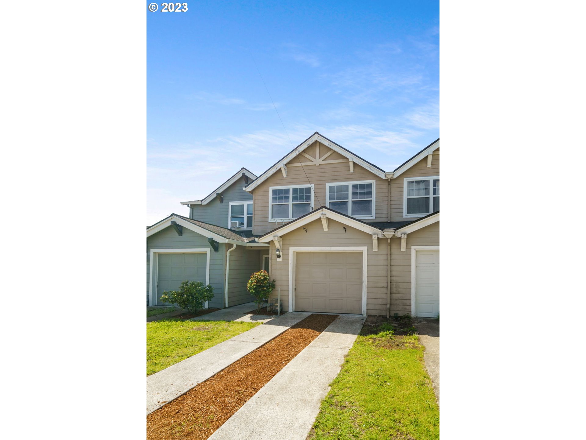 8342 Southeast Clinton Street Portland, OR 97266 - Photo 24 of 25 a view of a house with a yard
