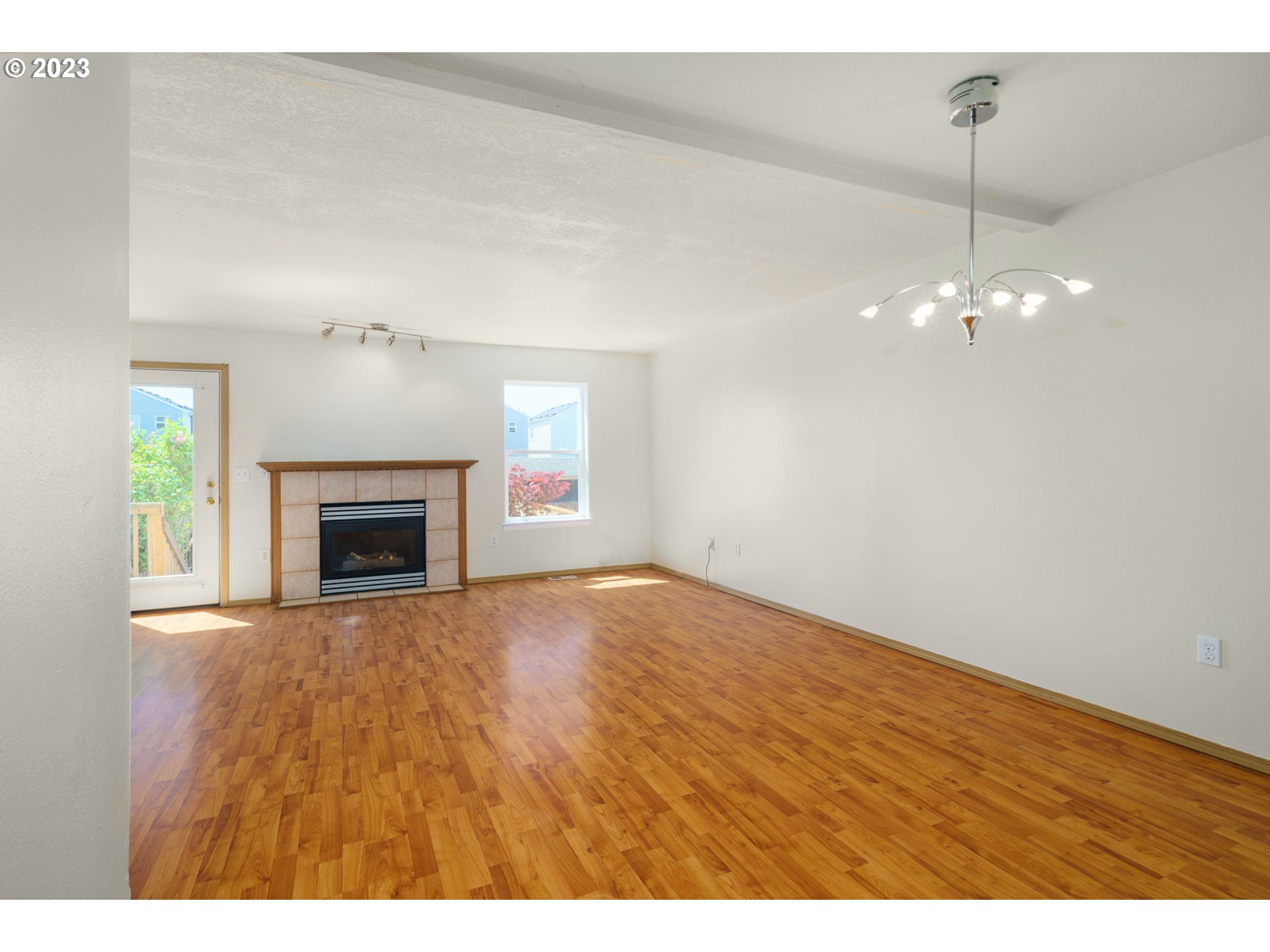 8342 Southeast Clinton Street Portland, OR 97266 - Photo 7 of 25 a view of empty room with fireplace