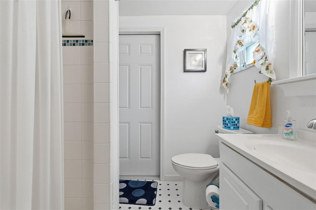 9420 Glen Moor Lane Port Richey, FL 34668 - Photo 23 of 36 a bathroom with a sink toilet and shower
