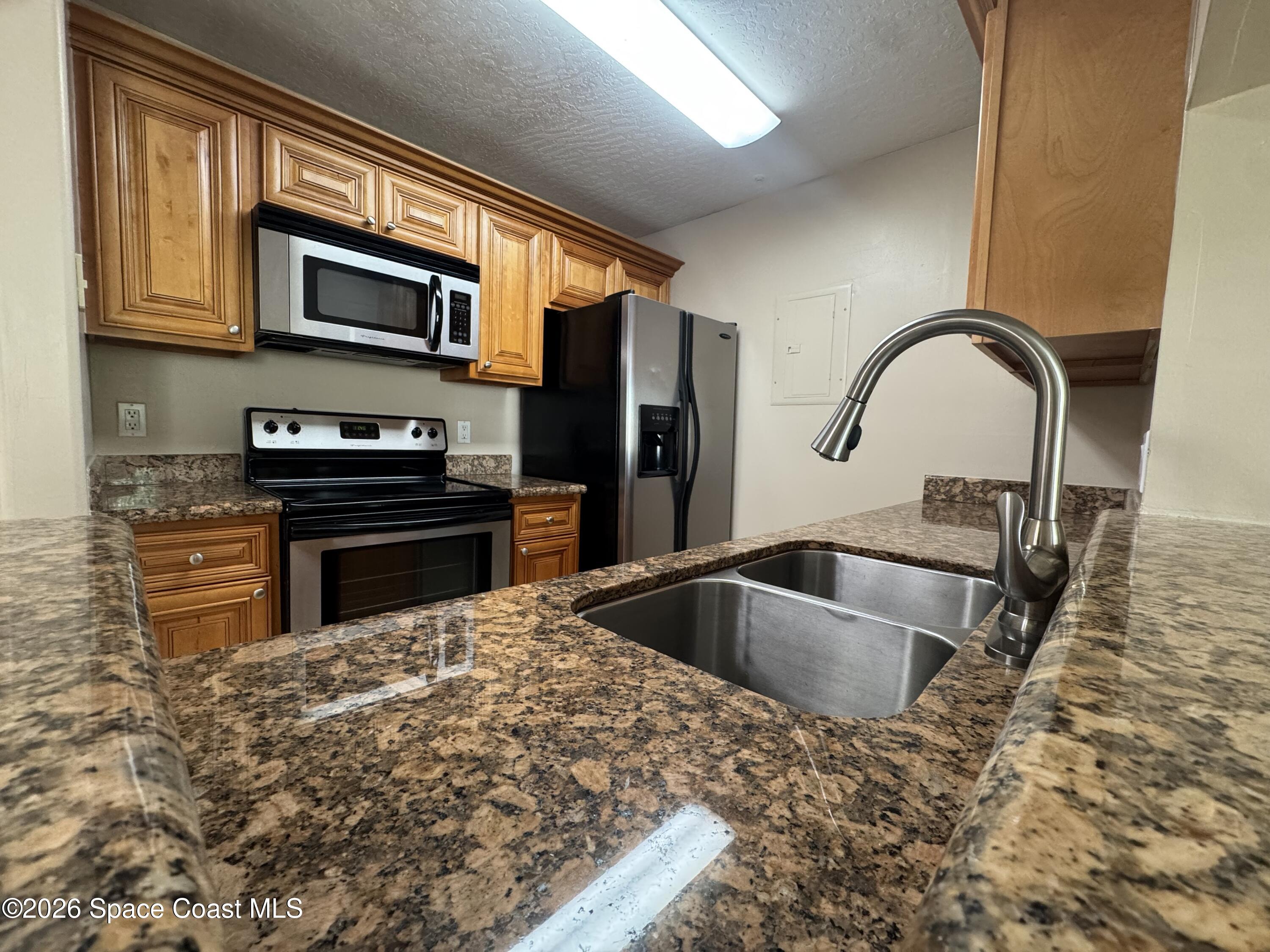 7667 North Wickham Road, Unit 416 Melbourne, FL 32940 - Photo 7 of 23 IMG_7230