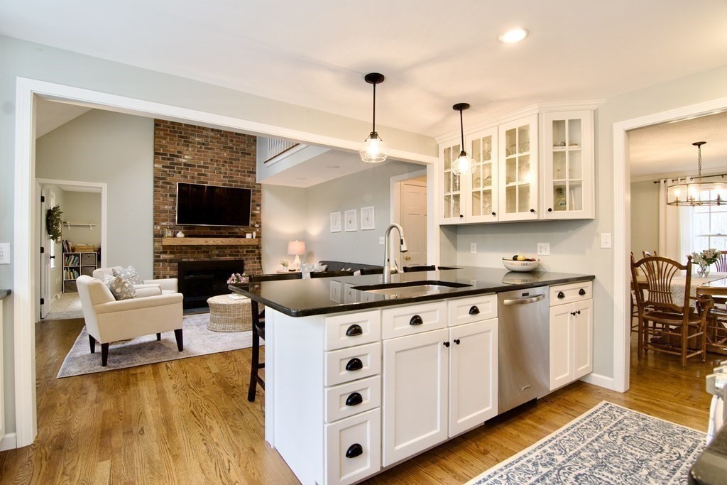 215 Maynard Road Wilbraham, MA 01095 - Photo 11 of 42 a large kitchen with stainless steel appliances granite countertop a sink and cabinets