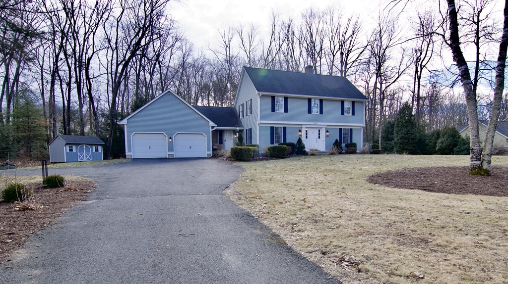 215 Maynard Road Wilbraham, MA 01095 - Photo 2 of 42 a house view with a outdoor space