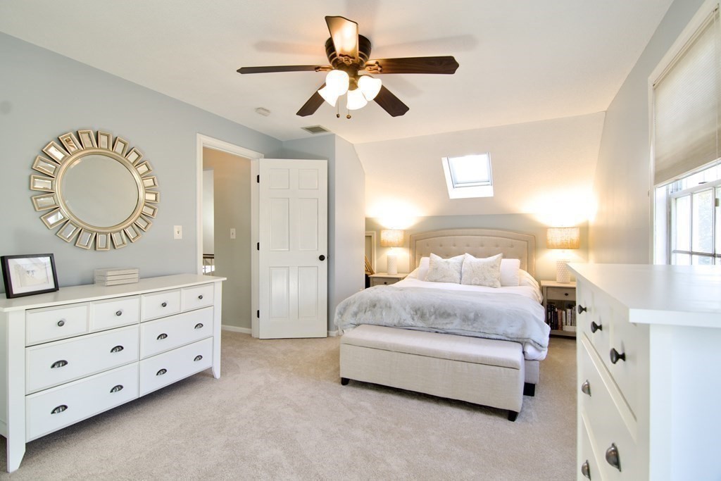 215 Maynard Road Wilbraham, MA 01095 - Photo 34 of 42 a spacious bedroom with a bed and a dresser