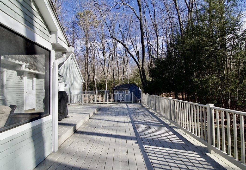 215 Maynard Road Wilbraham, MA 01095 - Photo 5 of 42 a view of a building with large trees