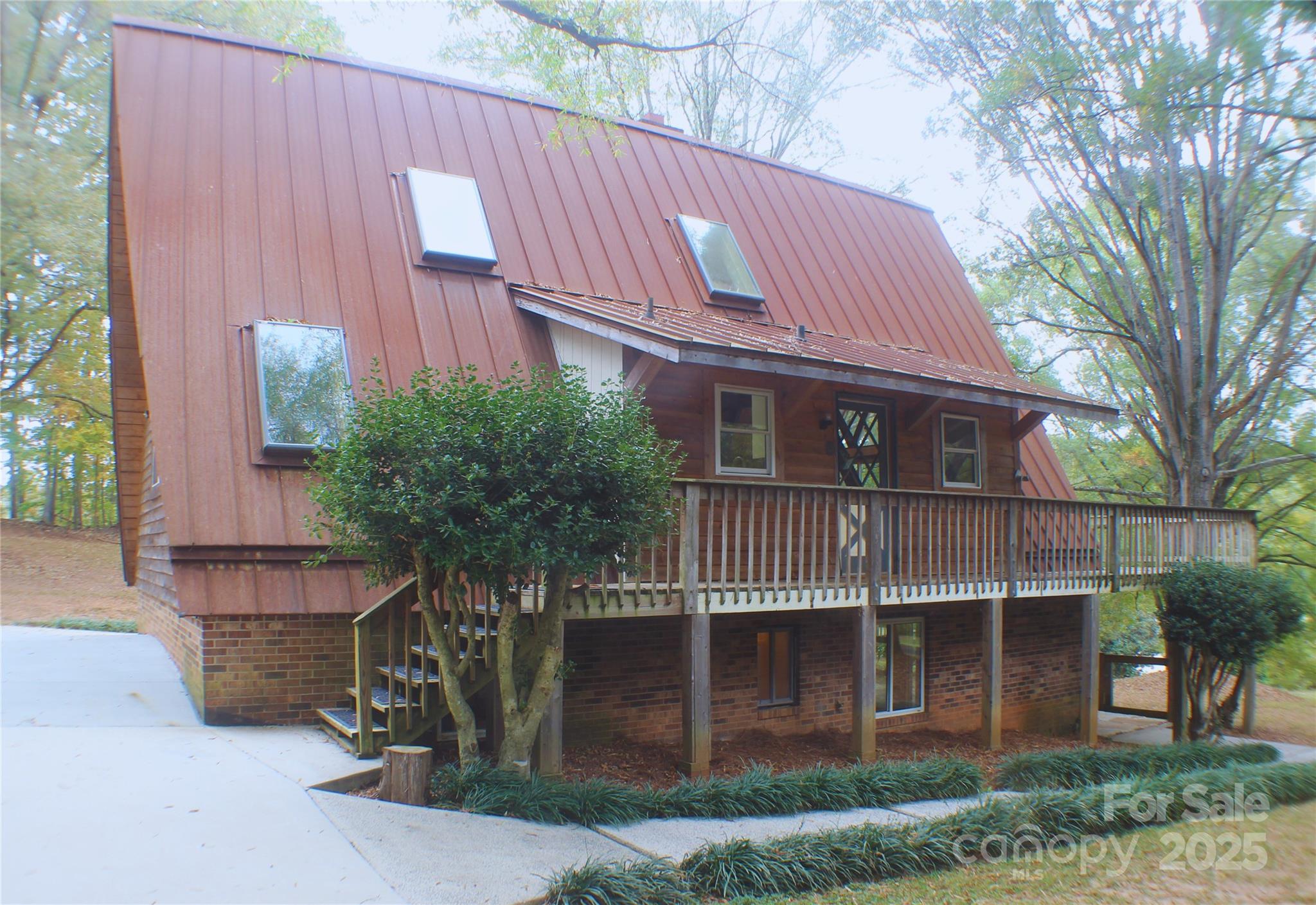 2950 Beroth Road Pfafftown, NC 27040 - Photo 2 of 39 a front view of a house with garden